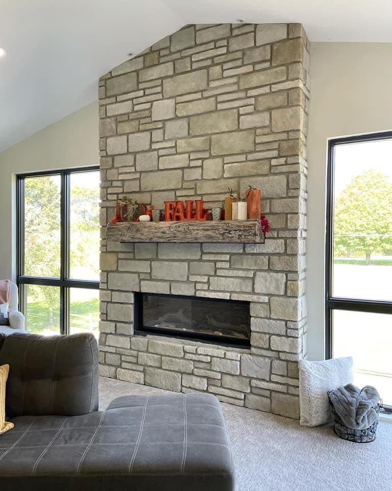 Daley's Plumbing & Heating, Inc. Fireplace with Natural Stone