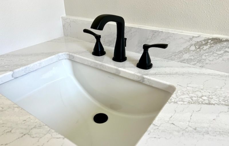 Daley's Plumbing & Heating, Inc. Faucet and Sink image